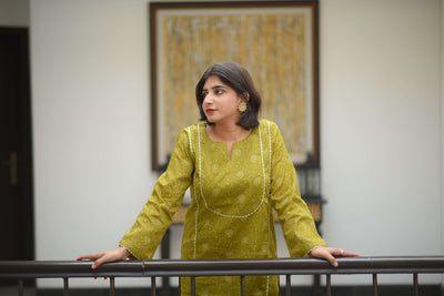 Olira – Kurta Set with Golden Floral Detailing