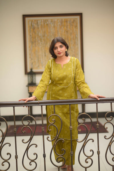 Olira – Kurta Set with Golden Floral Detailing